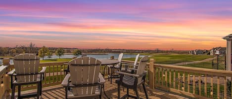 View of Sunset off the deck overlooking the 15th hole.