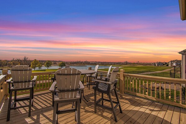 View of Sunset off the deck overlooking the 15th hole.