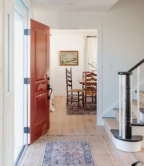 Step inside from the front entryway and you're greeted by the dining room, the stairwell upstairs, a hallway to the living room or to your right is the study.