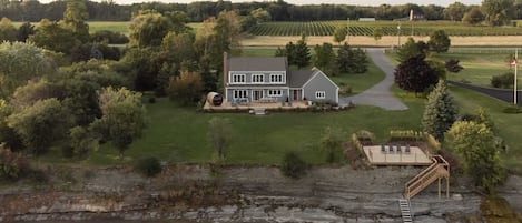 Limestone shelf swimming in the front and vineyards in the back. The Hull House checks all the Prince Edward County boxes.