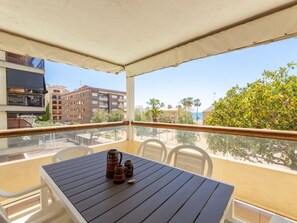 Building, Table, Shade, Wood, Tableware, Outdoor Furniture, Interior Design, Porch, Sky, Condominium