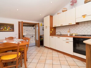 Cabinetry, Furniture, Countertop, Chair, Orange, Kitchen, Wood, Table, Architecture, Interior Design