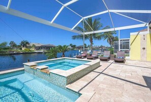 Beautiful Pool Area with Lounges and Spa