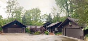 Plenty of parking for four vehicles in garages.