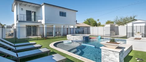 Heated saltwater pool and spa.

Please note, fire feature is non-operational.