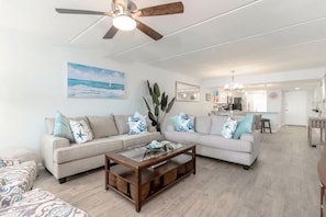 Our coastal vibes flow throughout the space thanks to a lovely open-concept floor plan.