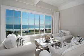 Sitting area in master bedroom and a stunning view of the ocean.