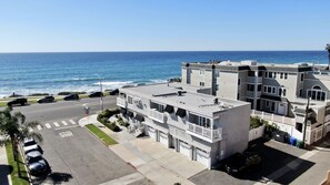 Located across the street from the beach. Unit C is on the side in the middle of the building.