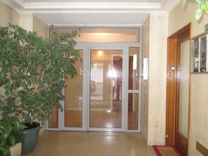 Secondary entrance to building with announcer