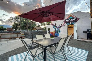 Enjoy meals outdoors in our spacious dining area, complete with a sunshade for perfect Colorado days.
