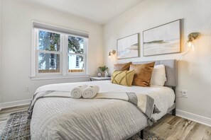 Retreat to this cozy bedroom with a king-sized bed and luxurious linens for a restful night's sleep.