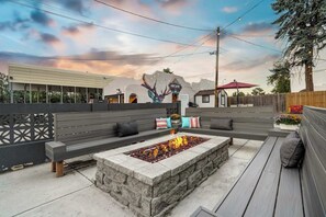 Gather around the custom-built fire pit for a cozy evening with friends and family.