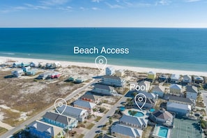 Steps away to the beach and 2 pools