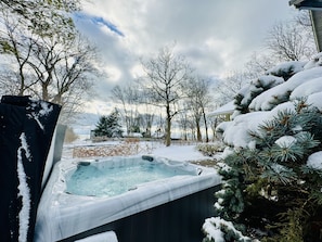 Waterfront view of the Lake from the hot tub! Love freshly fallen snow! 
