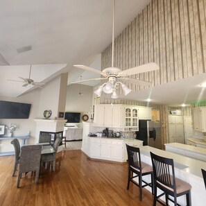 Kitchen has another Table plus the High chairs over the counter. 58" TV 1stFloor