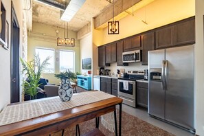 Top Floor with Spectacular Skyline and Mountains Views in this Truly Open Concept 