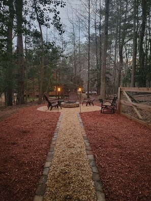 Fire pit area with solar lights, great location for S'mores!