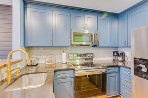 A FULLY Stocked Kitchen with Full Sized Appliances. 