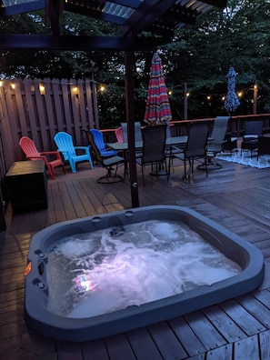 Jacuzzi with outdoor string lights