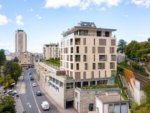 Cloud, Sky, Building, Window, Plant, Car, Tree, Infrastructure, Vehicle, Urban Design