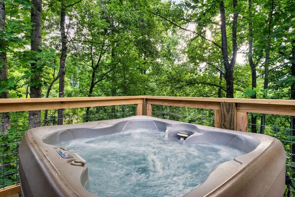 Relax on the deck in the hot tub!