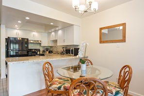 Fully stocked kitchen and dining area