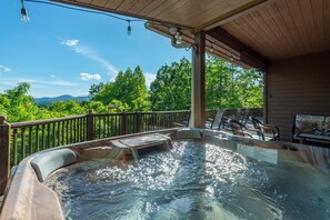 The expansive deck offers long-range mountain views & a covered area to cool off from the sun or retreat from rainy weather.