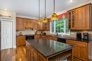 Kitchen with a dishwasher & 2 types of coffeemakers (Drip-style & Keurig).
