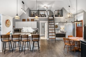 Main Living Area - A wonderful use of the space, this carriage house is the back part of the main home. It has it's own private entrance and parking and is locked off from the main home.