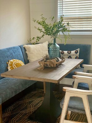 Perfect cozy spot to eat dinner or work remote on your laptop!