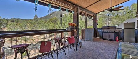 Upper Patio overlooking forest and mountain view.
