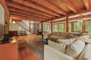 Light filled and open living room with Smart TV and sectional, for cozy Berkshire nights.