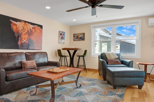 Living room overlooking the resort plaza with plenty of space to relax and unwind