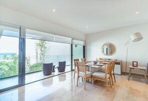 DINING ROOM & BALCONY WITH OCEAN VIEW