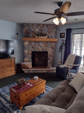 Warm and comfortable living area, with swivel rocker