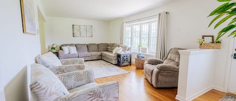Living room with large sectional and recliner