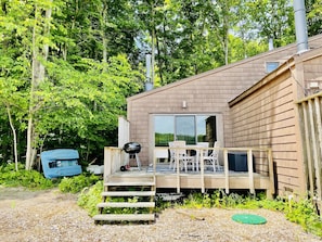 A spacious back deck with room to enjoy outdoor dining or just lounge. :) 