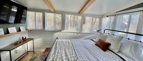 Our cozy master bedroom with a queen size bed