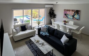 Dining and living area with a pull-out sofa bed.
