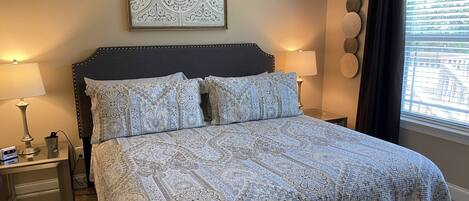 Large bedroom has adjustable King bed and blackout curtains for those mornings you want to sleep-in.