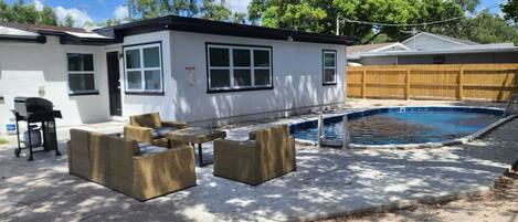 Comfortable seating area just beside our beautiful heated pool. Enjoy and create memories you could treasure with loved ones while you are home away from home! If you like what you see, send us an inquiry right away!