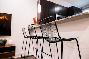 Breakfast bar seating with bar stools.