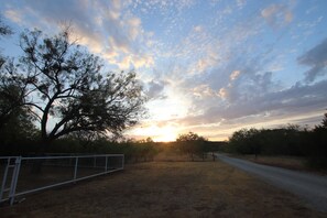 Sunrise from the fence line. Plenty of room to park a boat.