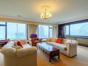 Living room | Orchard Lodge - Orchard Holidays, Woolaston, near Forest of Dean