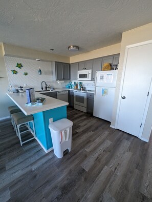 Alternate view of the kitchen and game closet