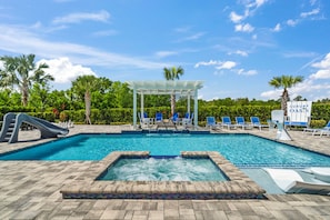 Unwind in style at Reunion Resort, featuring pristine pools and breathtaking views.