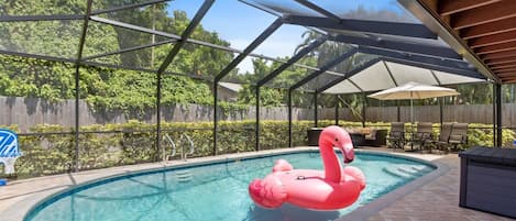 Large beautiful pool awaits you with large patio sets that will fit entire family. Come out here to enjoy the sunshine, grab a bite to eat, or just relax poolside. Fun for everyone who joins! 