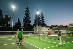 Everyone loves pickle ball, vacation in style with your own professional private pickle ball court.  Newly built custom court for your enjoyment.  Fully lit for an evening game. Four paddles and balls provided