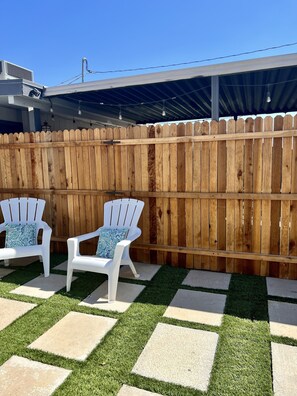 Private yard fully fenced in for your enjoyment
Fire pit and grill