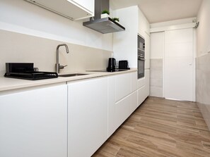 Cabinetry, Property, Sink, Countertop, Kitchen Sink, Kitchen Stove, Kitchen, Kitchen Appliance, Wood, Interior Design